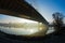 Misty sunrise on a river bank under cable bridge in Belgrade