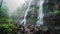 Misty Waterfall Cascading Over Rocky Terrain