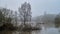 Misty Waterside Trees in Flooded Park, Burton on Trent England 2024