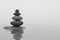 Misty Zen: Stones in Silent Contemplation