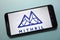 Mithril MITH cryptocurrency logo displayed on smartphone