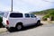 Mitshibushi L200 pick up truck white with cover rear bed bucket parked in the street