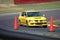 Mitsubishi Evolution Sedan driving on Race Course