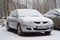 Mitsubishi Lancer 9 car covered by first october snow in Russia