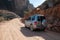 Mitsubishi Pajero in gravel road in Wadi bani Awf, Oman