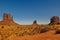 The Mittens and Merricks Butte, rock formations, in Monument Valley, Arizona