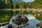 Mittlerer Gosausee in Austria in summer, rocks in water