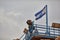 Mitzpe Ramon, 02 December 2016: Photographer near Israeli flag a