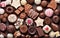 Mix of chocolate candies of different design with top view