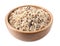 Mix of different brown rice in wooden bowl isolated