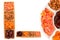 Mix of dried fruits and nuts. Apricot, raisin, cranberry, dates fruit. Isolated on a white background. Space for text or design
