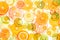 Mix of fresh transparent citrus fruits on white
