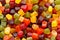 A mix of Midget Gems candy background, texture. sweet food