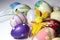 Mix of multicolored vivid Easter eggs and rabbit