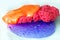 Mix of orange, pink and purple slime. Liquid art gel background