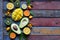 Mix of ripe tropical fruits with avocado, mango, coconut, carambola, banana, kumquat, pitahaya, kiwi. Superfood background. Vegeta
