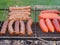 Mix of sausages and hot dogs on a plate
