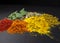 Mix of spices on dark background. Turmeric, paprika