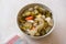 Mix of Turkish Pickles with Hot Green Pepper, Cabbage, Sauerkraut, Carrot and Cucumber in Bowl.