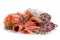 Mixed air cured sliced meats isolated on white.