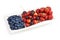 A mixed arrangement. Assorted berries including blueberries, strawberry and cherry, isolated on white background