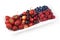 A mixed arrangement. Assorted berries including strawberry, cherry, blueberries and raspberries, isolated on white background