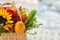 Mixed autumn flowers in basket, bouquet is on the windowsill with copy space.