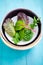 Mixed baby leaf salad in bowl