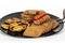Mixed Biscuits Like Hearts Shaped Biscuit Tied With Red Ribbon And Oblong Biscuits In Non Stick Pan