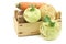 Mixed cabbage and root vegetables in a wooden crate