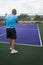 Mixed Doubles Pickleball Action - The Serve