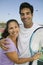 Mixed doubles Tennis Players on tennis court portrait