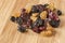 Mixed Dried Fruit, with Raisins, Cherries, Blueberries, Cranberries, on a Bamboo Board