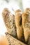 Mixed french organic french baguette bread in bakery display