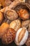 Mixed Fresh Bread as background, top view.  Rustic loaves of bread close up.   Food concept