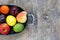 Mixed fruits of apples, lime, lemon, pears and plums in metal tray