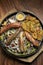 Mixed german traditional organic sausage and potato meal platter