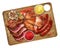 Mixed grilled meat platter, grilled garlic and chili pepper on wooden background