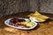 Mixed meat barbecued and served with french fries in restaurant in the cave, Guayadeque Ravine, Gran Canaria, Spain