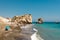 Mixed pebble and sand beach at Aphrodite Rock site in Cyprus