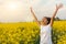 Mixed Race African American Girl Teenager Celebrating In Yellow