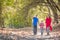 Mixed Race Caucasian and Hispanic Family Taking a Walk Outside