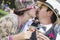 Mixed-Race Couple Dressed in 1920â€™s Era Fashion Sipping Champagne