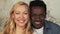 Mixed race ethnicity couple portrait. African american man and european woman posing face to face. Interracial