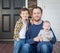 Mixed Race Father and Sons on Front Porch