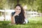 Mixed Race Girl Portrait Laying in Grass