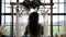 Mixed race modern bride silhouetted against a wedding alter. HD 24FPS.