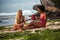 Mixed race surfer girls on the beach