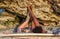 Mixed race surfer girls lying on the back on surfboard