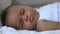 Mixed race toddler baby sleeping portrait. Spbi calm infant sleep peaceful closeup. small newborn